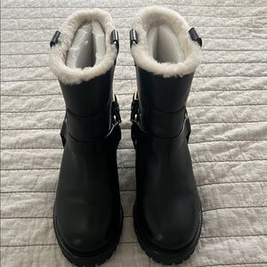 Tory Burch Black Ankle Boots with Cream Lining. New....never worn. Size 9